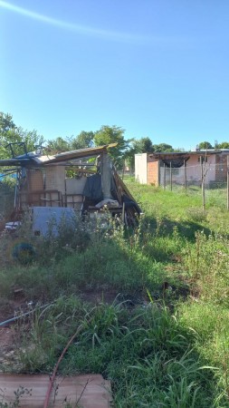 VENDO HERMOSO TERRENO EN GENERAL RODRIGUEZ, SOBRE PAVIMENTO COLECTIVO ALFRENTE, PROXIMO COLEGIO PRIMARIO Y SECUNDARIO