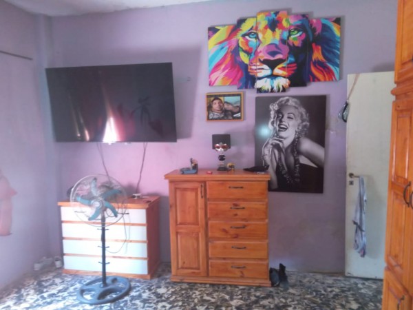 (A L Q U I L A D O)  AMPLIA CASA DE MATERIAL CON TERRENO EN BARRIO MI BARRIO, MORENO, CALLE POSADAS 5967